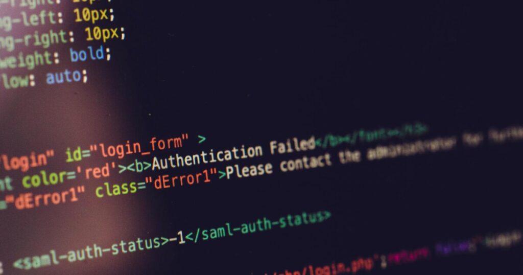 Close view of computer screen displaying HTML code with an authentication error.