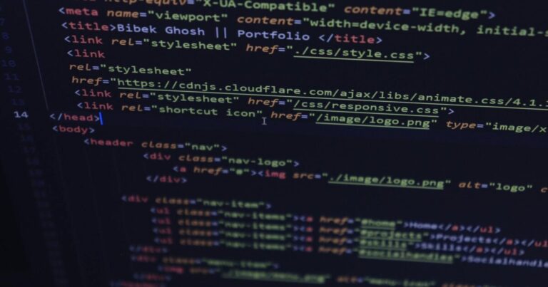 Close-up of HTML and CSS code displayed on a computer screen, ideal for tech and programming themes.
